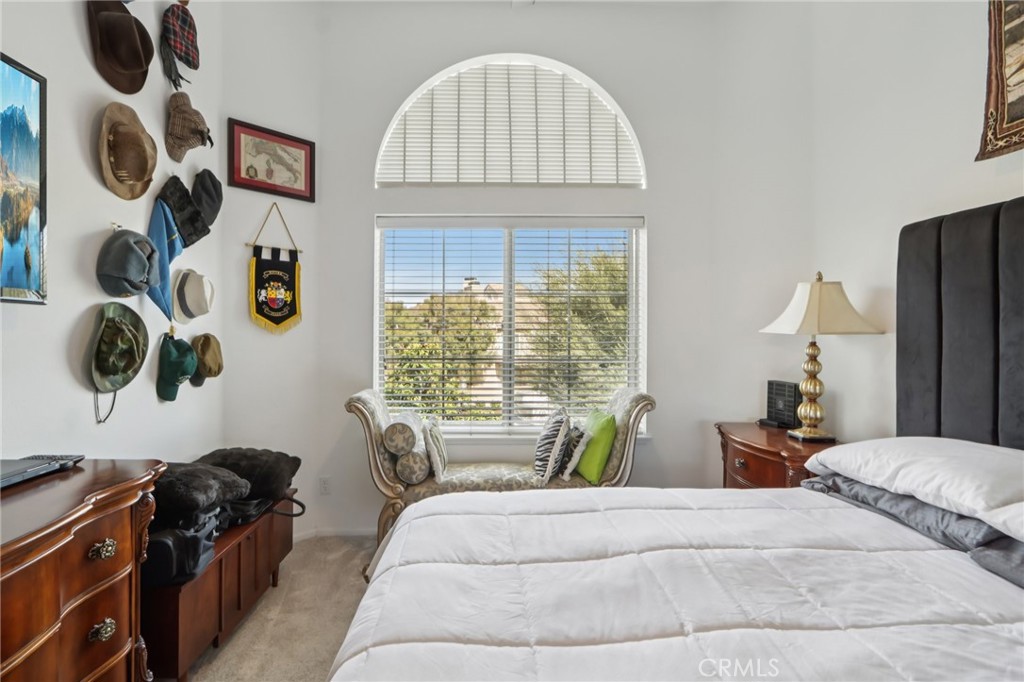 23605 Del Monte Dr., Unit 252 Valencia, CA 91355 - Photo 19 of 48 a bedroom with a bed and cabinets