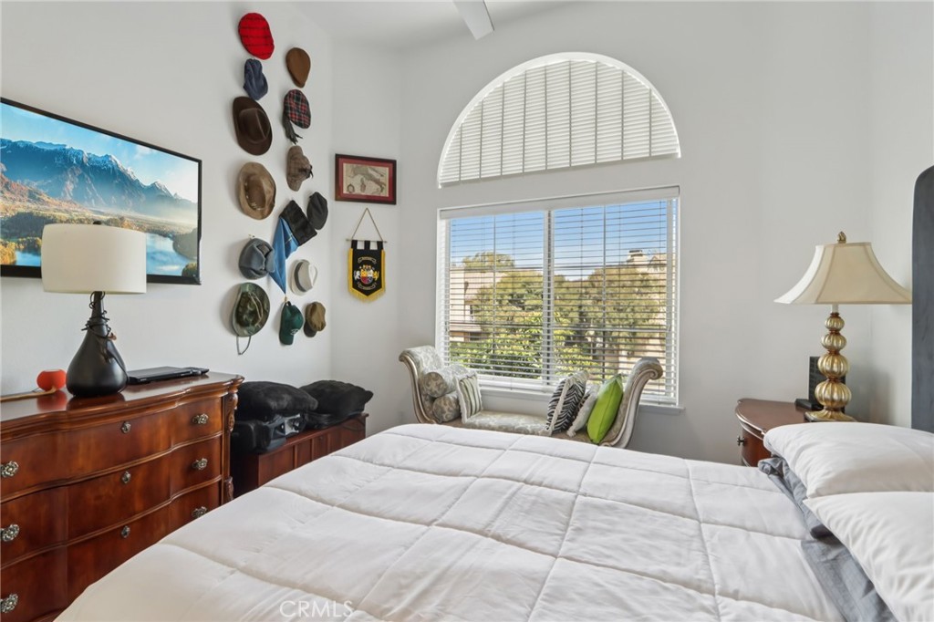 23605 Del Monte Dr., Unit 252 Valencia, CA 91355 - Photo 20 of 48 a bedroom with a large bed and a window