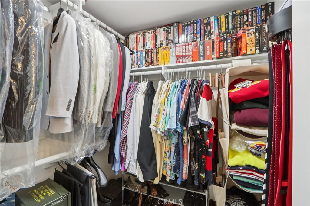 23605 Del Monte Dr., Unit 252 Valencia, CA 91355 - Photo 24 of 48 a view of walk in closet with clothes and shoes
