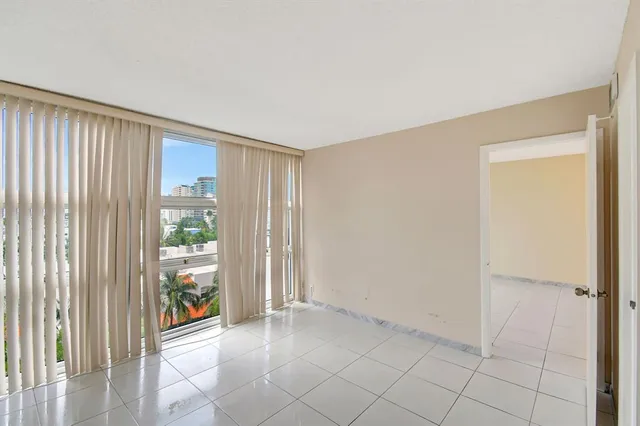 a view of an empty room and window