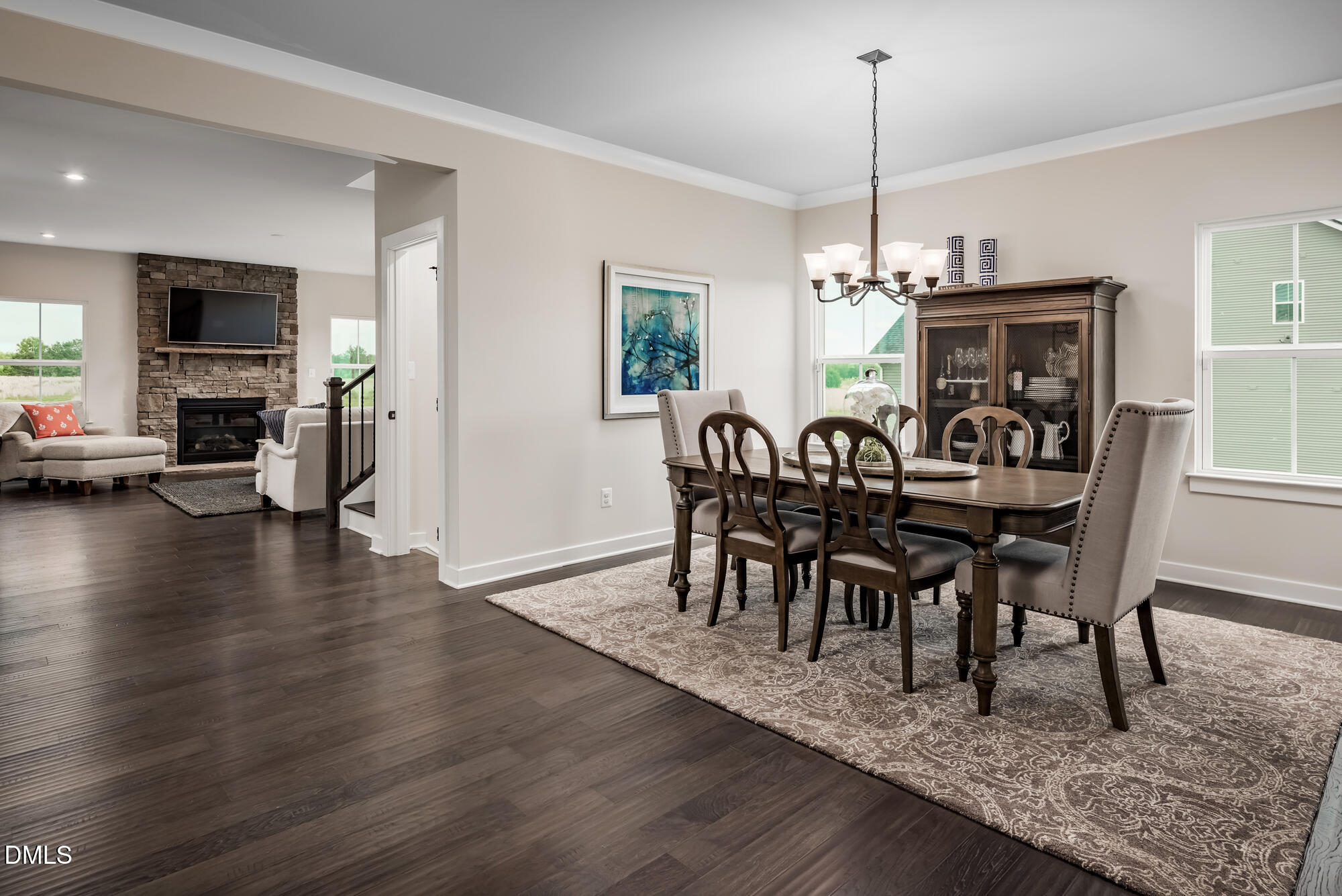 817 Walker Rdg Way Willow Spring, NC 27592 - Photo 9 of 23 a view of a dining room with furniture window and wooden floor