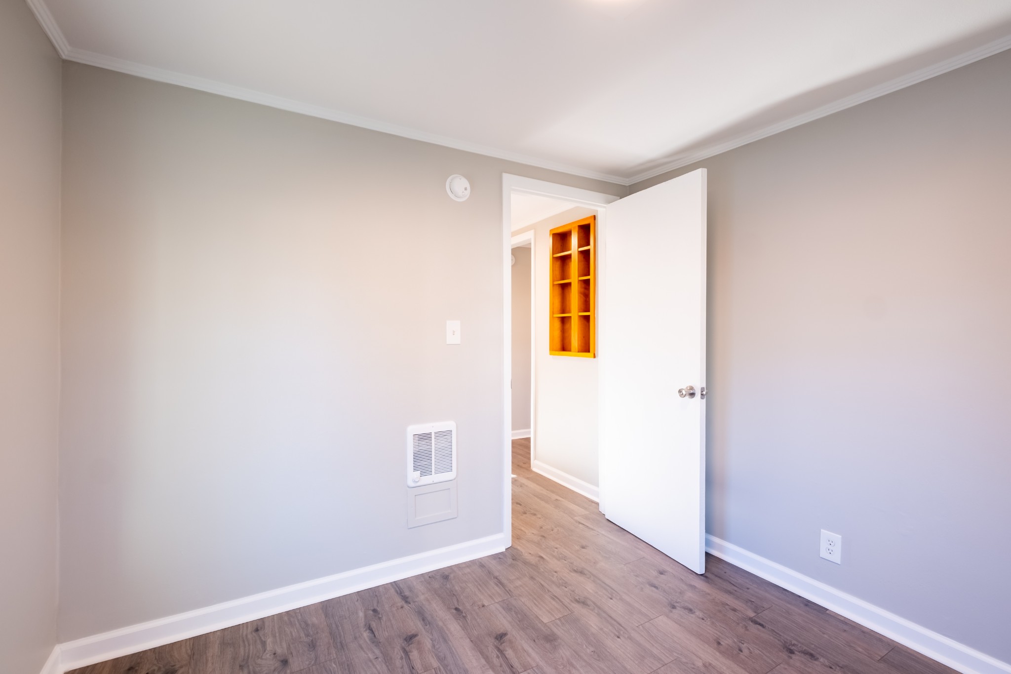 316 South Maple Street Tullahoma, TN 37388 - Photo 16 of 21 a view of an empty room with wooden floor