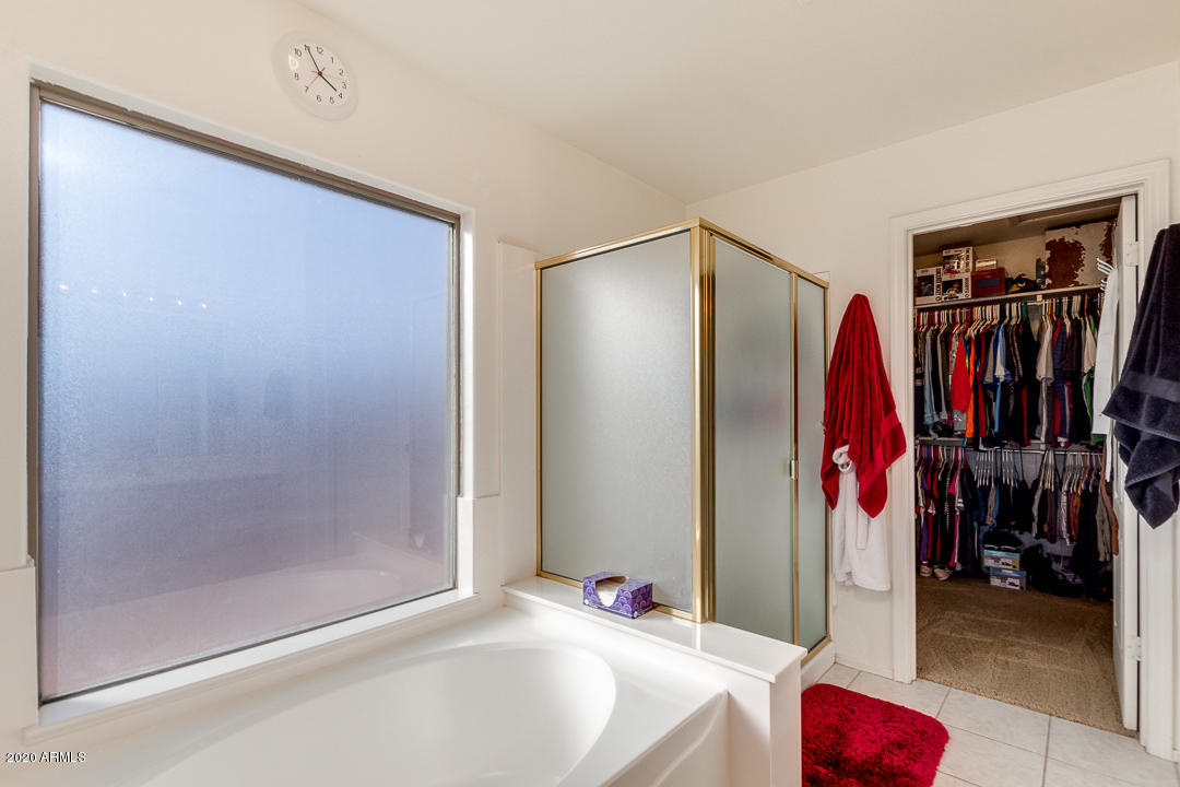 1163 East Ranch Court Gilbert, AZ 85296 - Photo 19 of 36 a very nice looking room with a bathroom