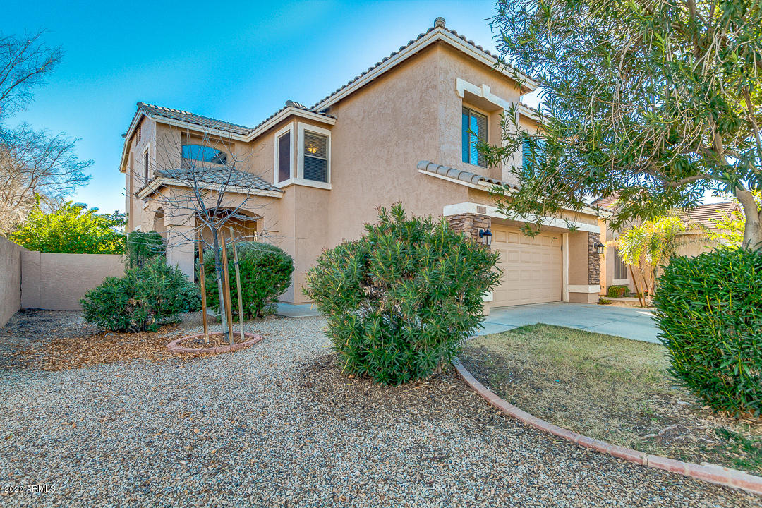 1163 East Ranch Court Gilbert, AZ 85296 - Photo 2 of 36 front view of a house with a street