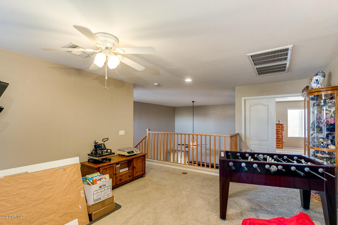 1163 East Ranch Court Gilbert, AZ 85296 - Photo 23 of 36 a room with furniture