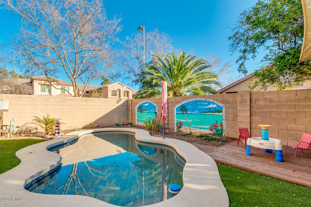 1163 East Ranch Court Gilbert, AZ 85296 - Photo 33 of 36 a view of outdoor space yard and swimming pool