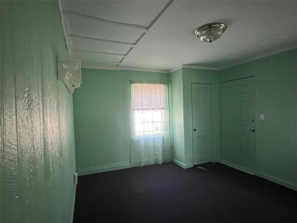 3529 Palm Road Shreveport, LA 71109 - Photo 3 of 18 Unfurnished bedroom featuring a closet and ornamental molding