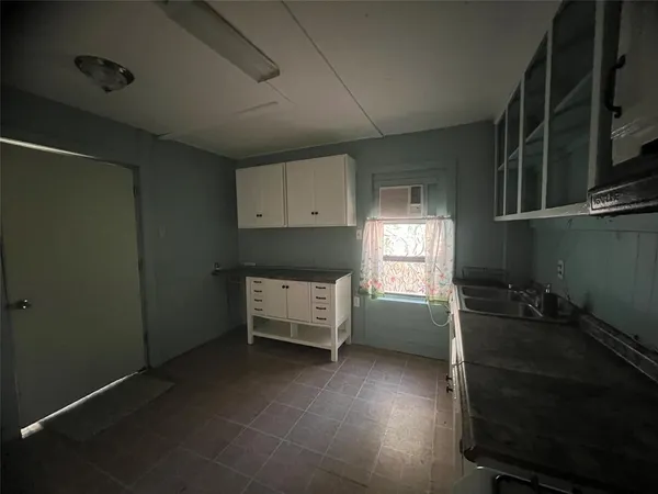 a room with furniture and window
