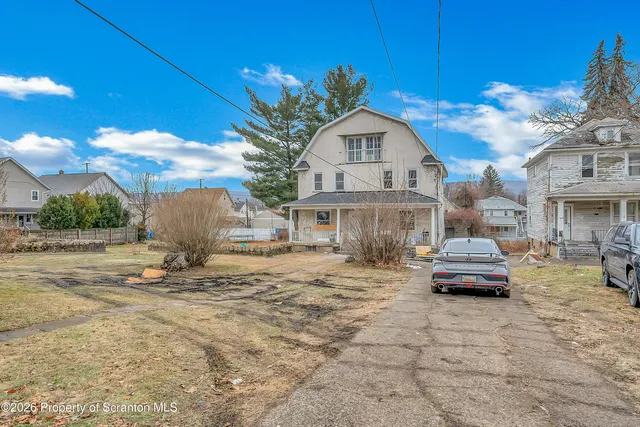 a front view of house with yard