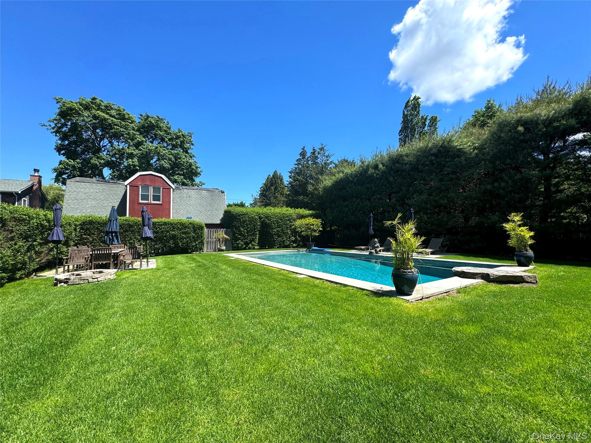 198 South Country Road Remsenburg, NY 11960 - Photo 4 of 49 a view of a garden with a slide