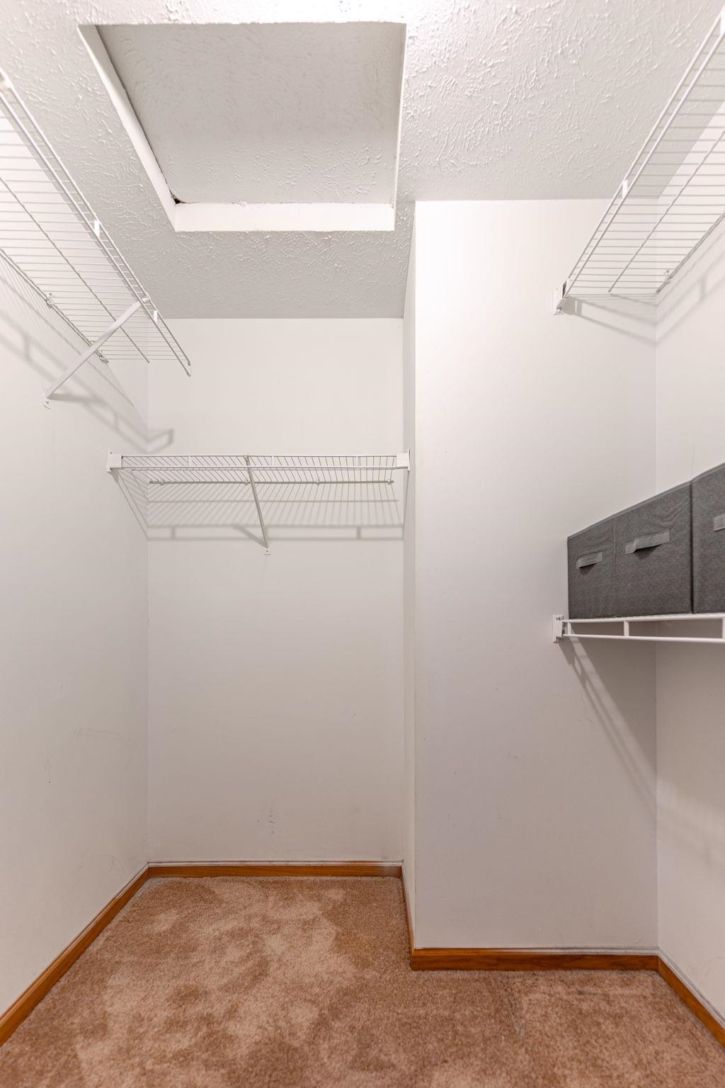 5694 Oak Village Drive Roscoe, IL 61073 - Photo 16 of 22 a view of a room with racks on the wall