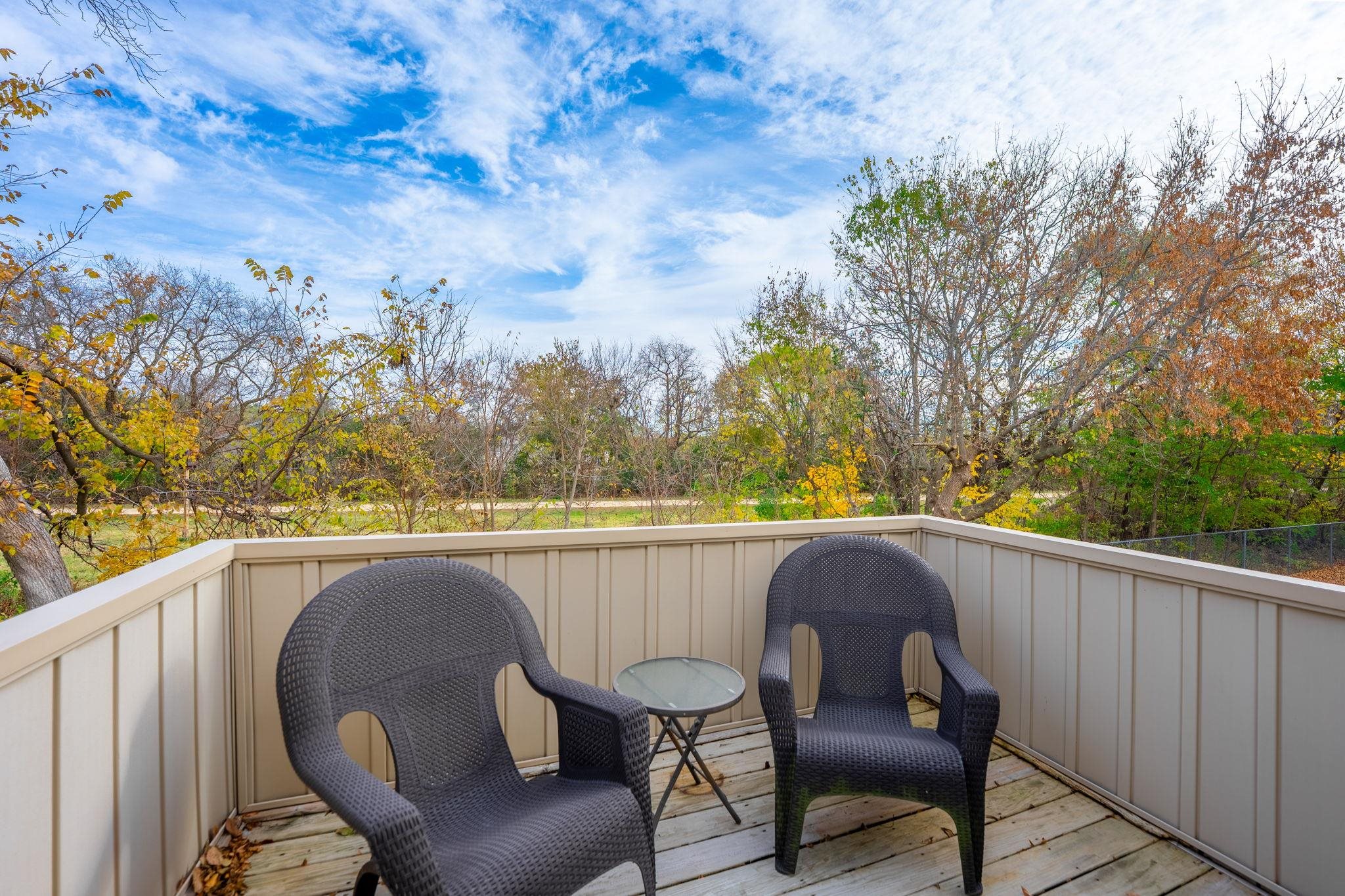5694 Oak Village Drive Roscoe, IL 61073 - Photo 22 of 22 a view of a chair and table in the balcony