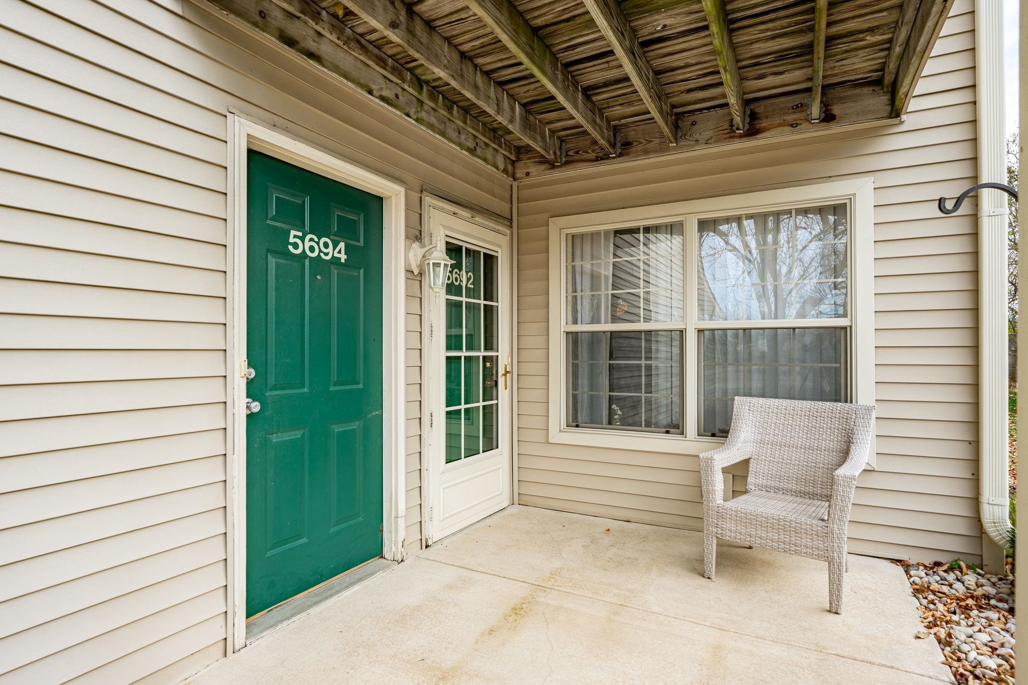 5694 Oak Village Drive Roscoe, IL 61073 - Photo 3 of 22 a view of chair in the balcony