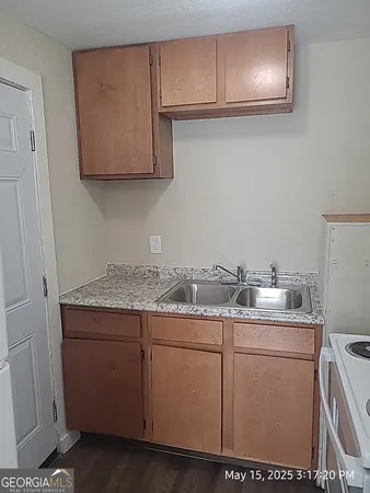 a utility room with cabinets