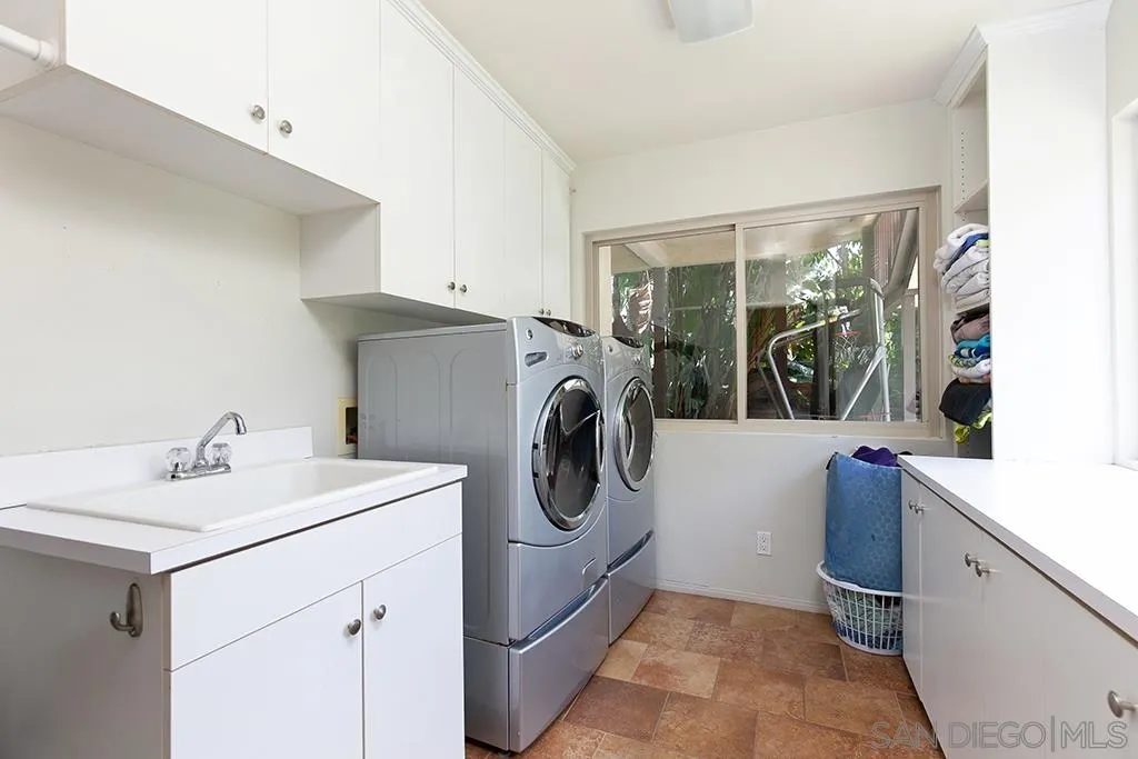 208 Rancho Santa Fe Road Encinitas, CA 92024 - Photo 29 of 45 a utility room with sink dryer and washer