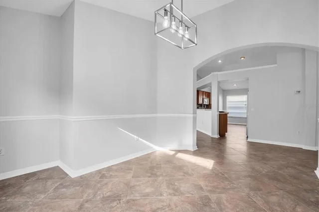 a view of a kitchen with a sink and dishwasher cabinets