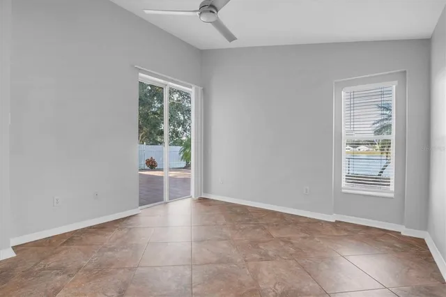 an empty room with windows