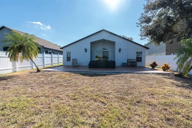 a terrace with outdoor seating and city view