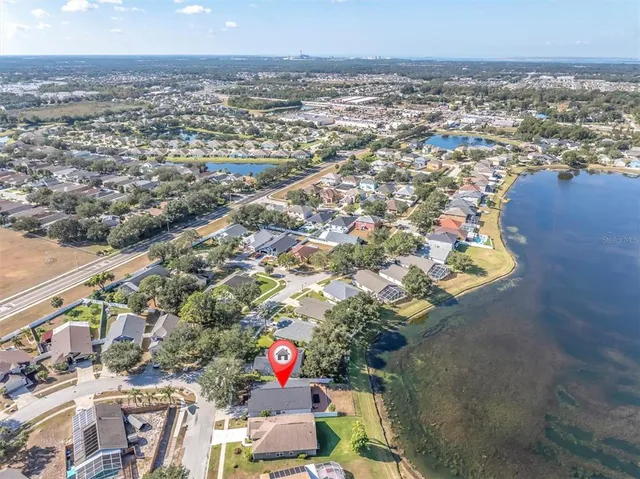 an aerial view of a city with lots of residential buildings
