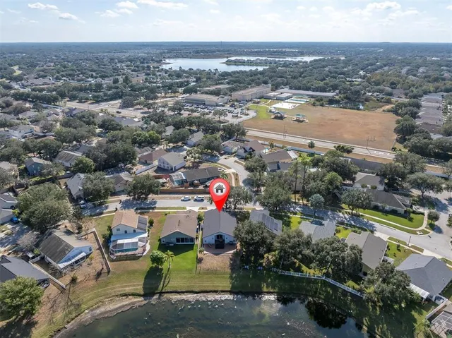 an aerial view of a houses with outdoor space