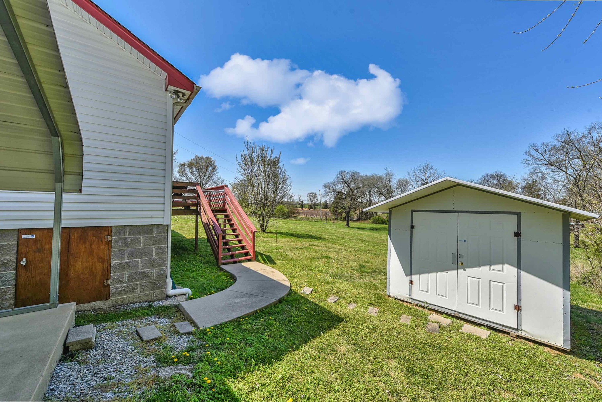 105 Tom Ferrell Road Portland, TN 37148 - Photo 14 of 31 a view of a house with a yard