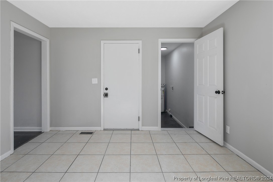 407 Ruth Street Spring Lake, NC 28390 - Photo 17 of 38 a view of an empty room