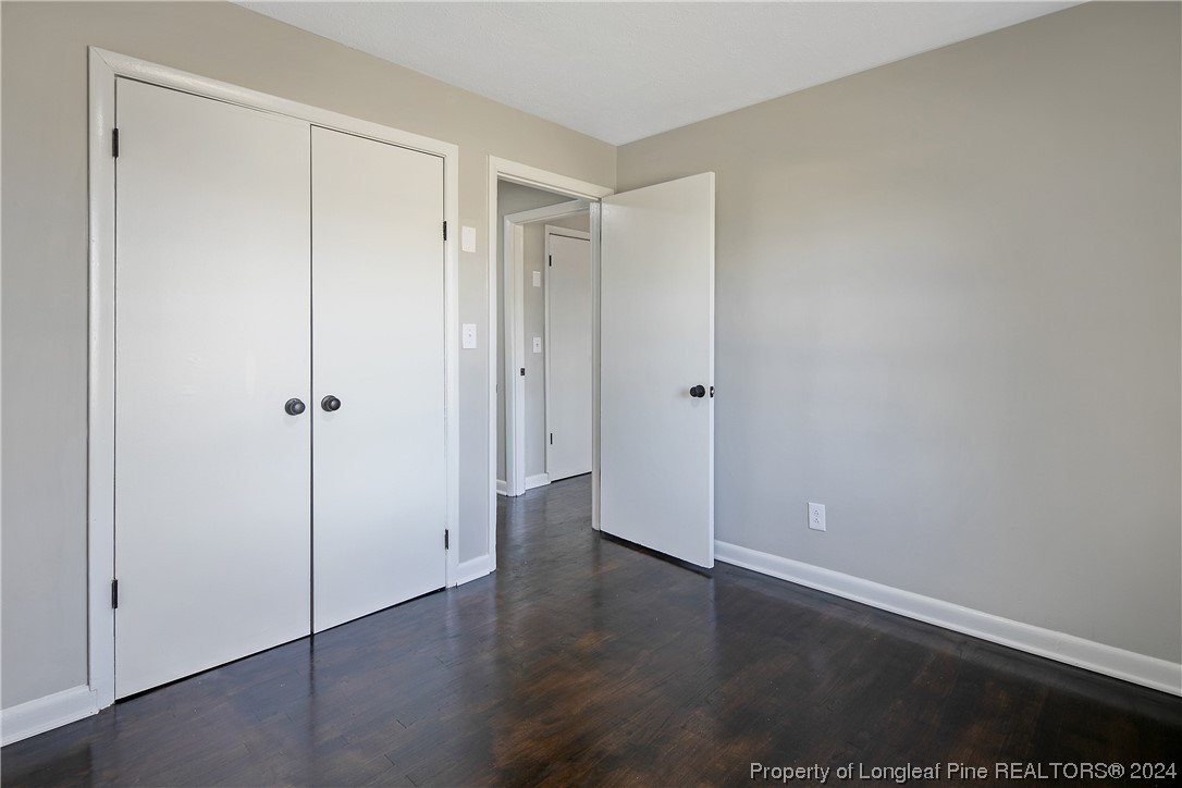 407 Ruth Street Spring Lake, NC 28390 - Photo 21 of 38 an empty room with wooden floor