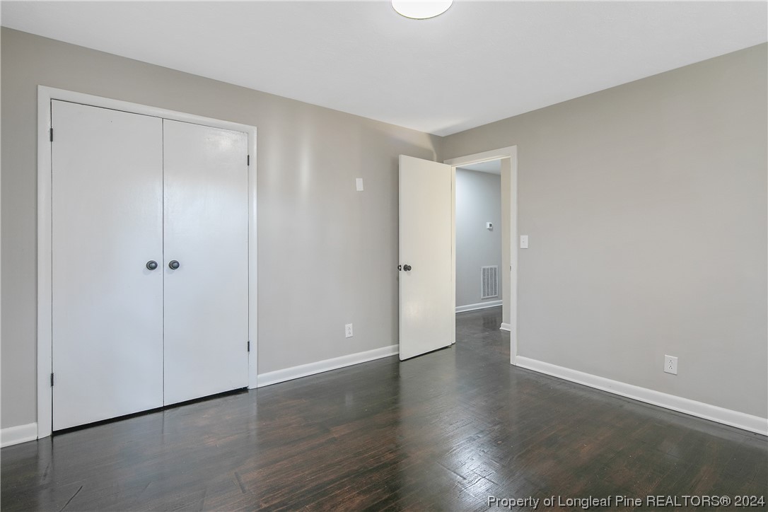 407 Ruth Street Spring Lake, NC 28390 - Photo 33 of 38 a view of a room with wooden floor