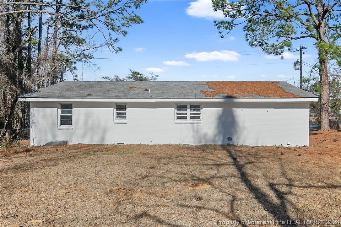 407 Ruth Street Spring Lake, NC 28390 - Photo 35 of 38 a view of a big room with an trees