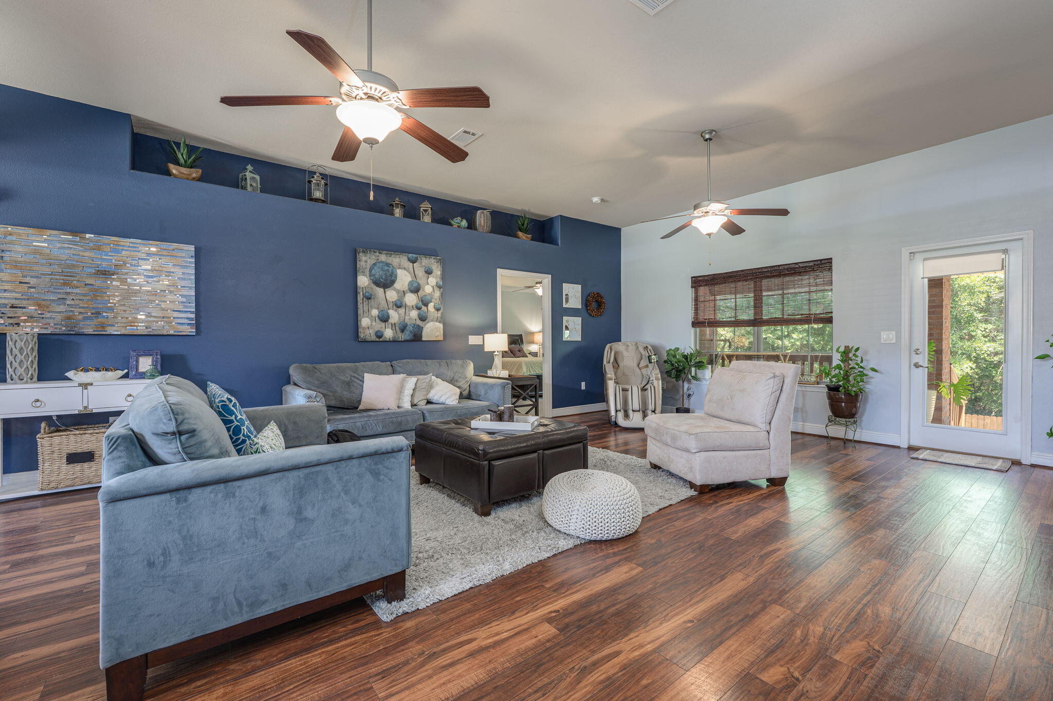222 Raptor Drive Crestview, FL 32536 - Photo 18 of 70 a living room with furniture and a wooden floor