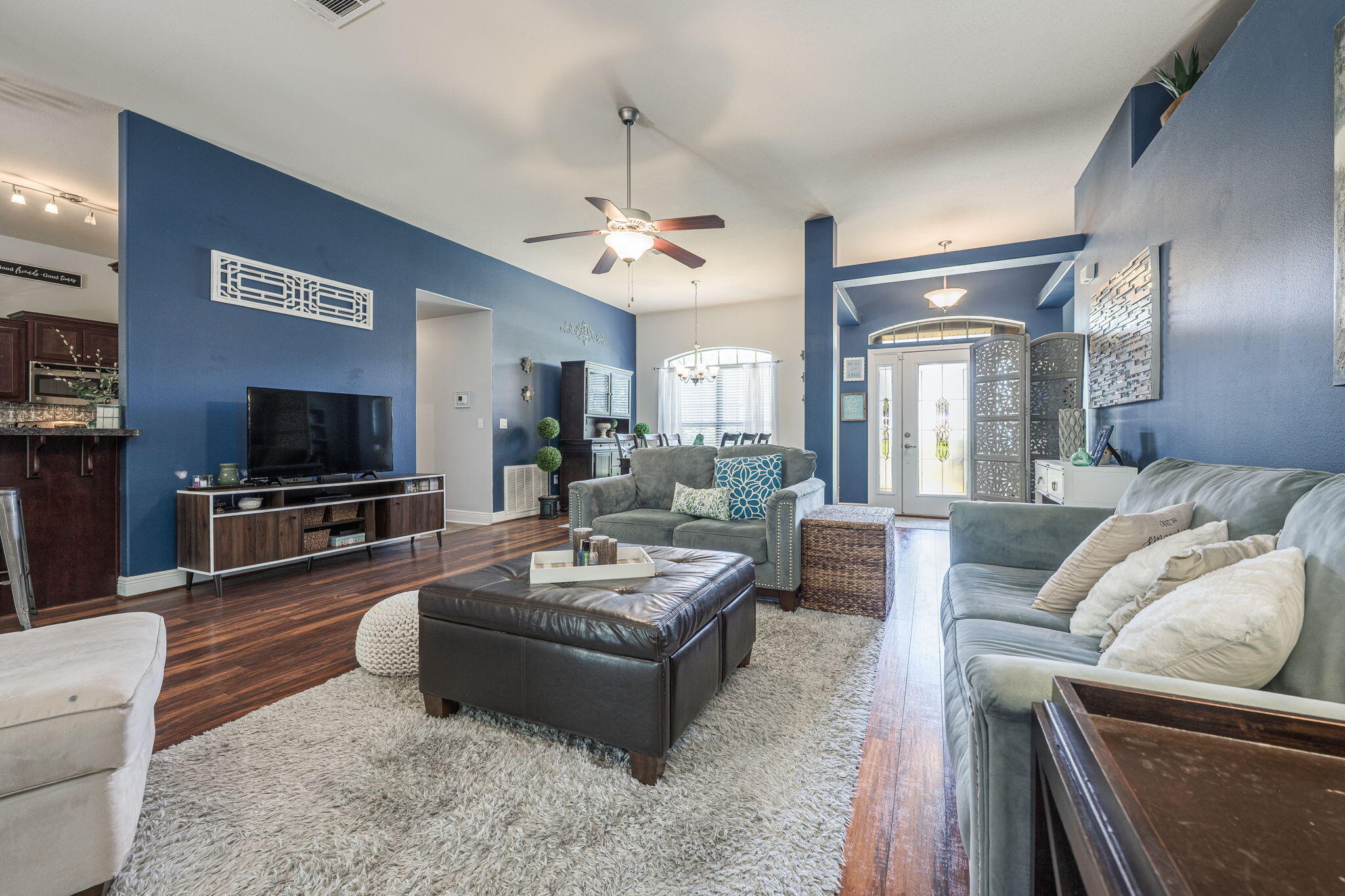 222 Raptor Drive Crestview, FL 32536 - Photo 21 of 70 a living room with furniture and a flat screen tv
