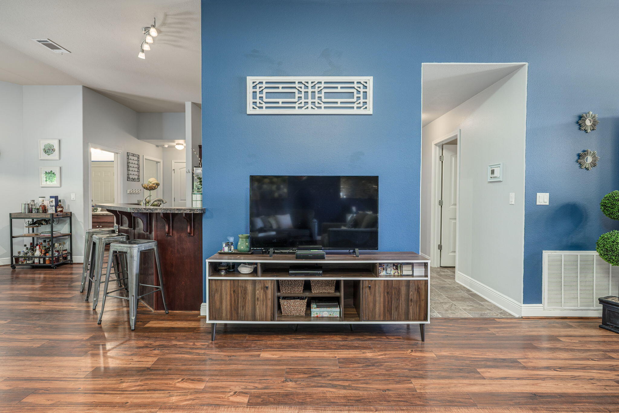 222 Raptor Drive Crestview, FL 32536 - Photo 22 of 70 a living room with furniture and a flat screen tv