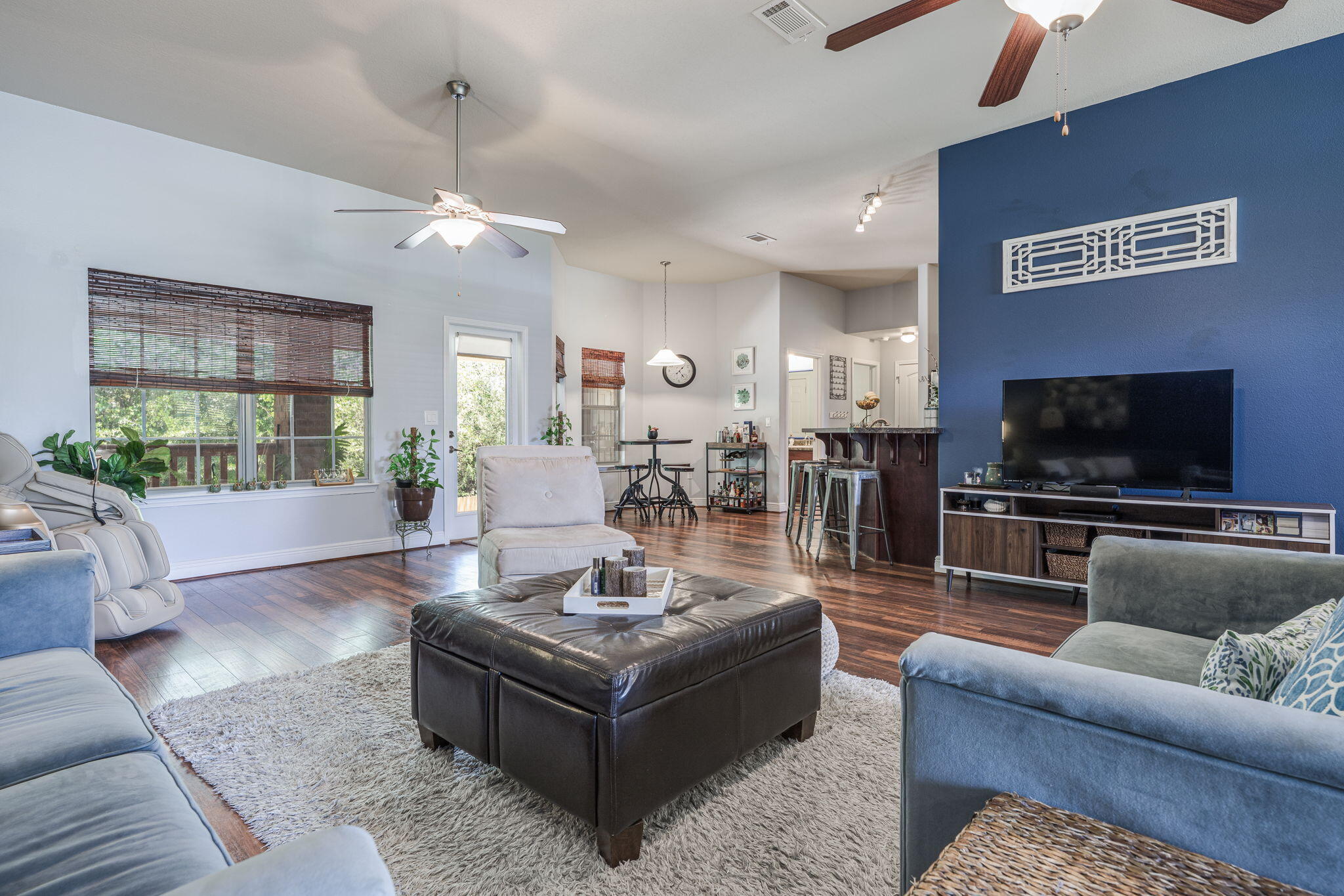 222 Raptor Drive Crestview, FL 32536 - Photo 23 of 70 a living room with furniture and a flat screen tv