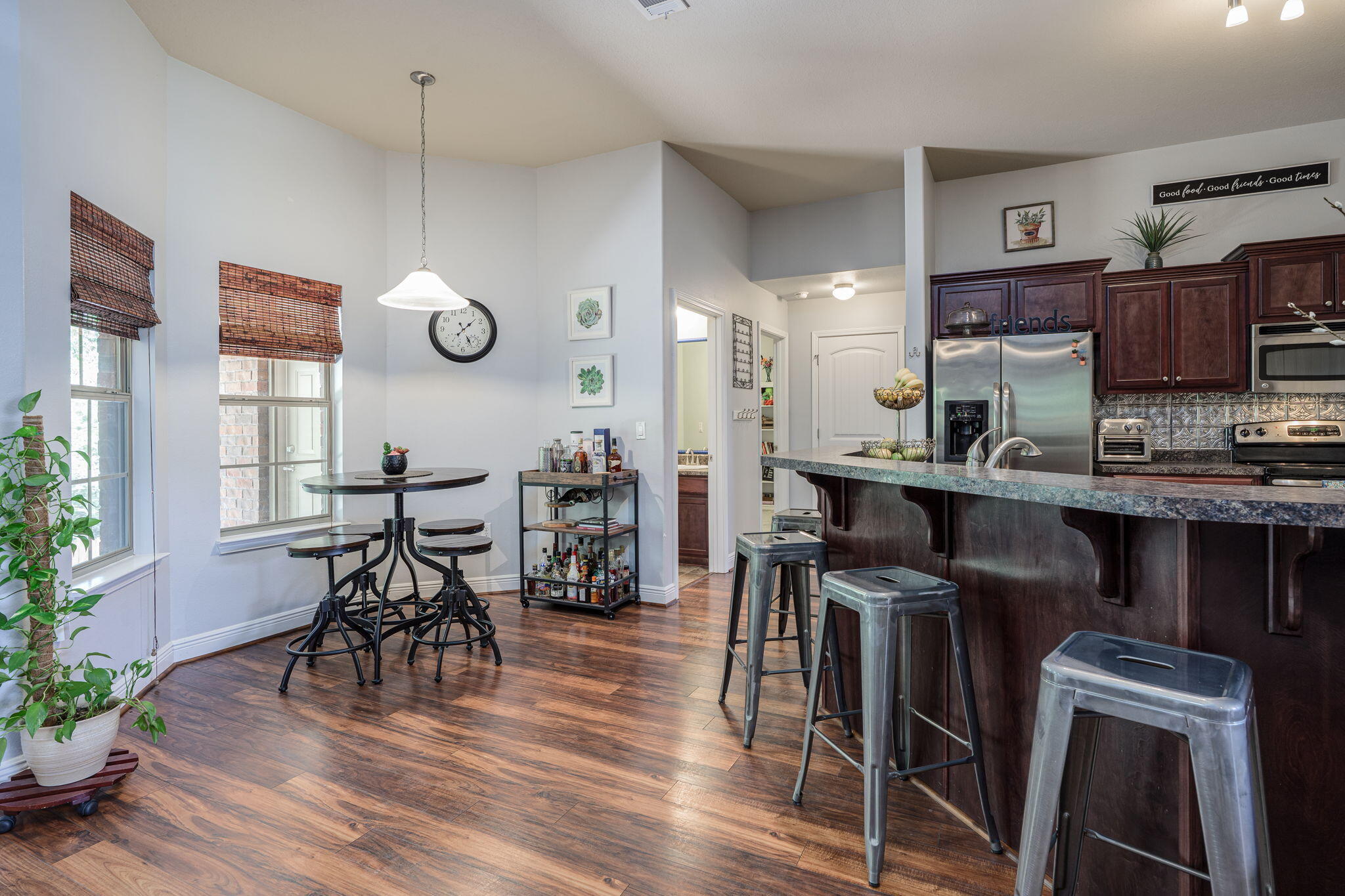 222 Raptor Drive Crestview, FL 32536 - Photo 24 of 70 a view of a dining room with furniture and wooden floor