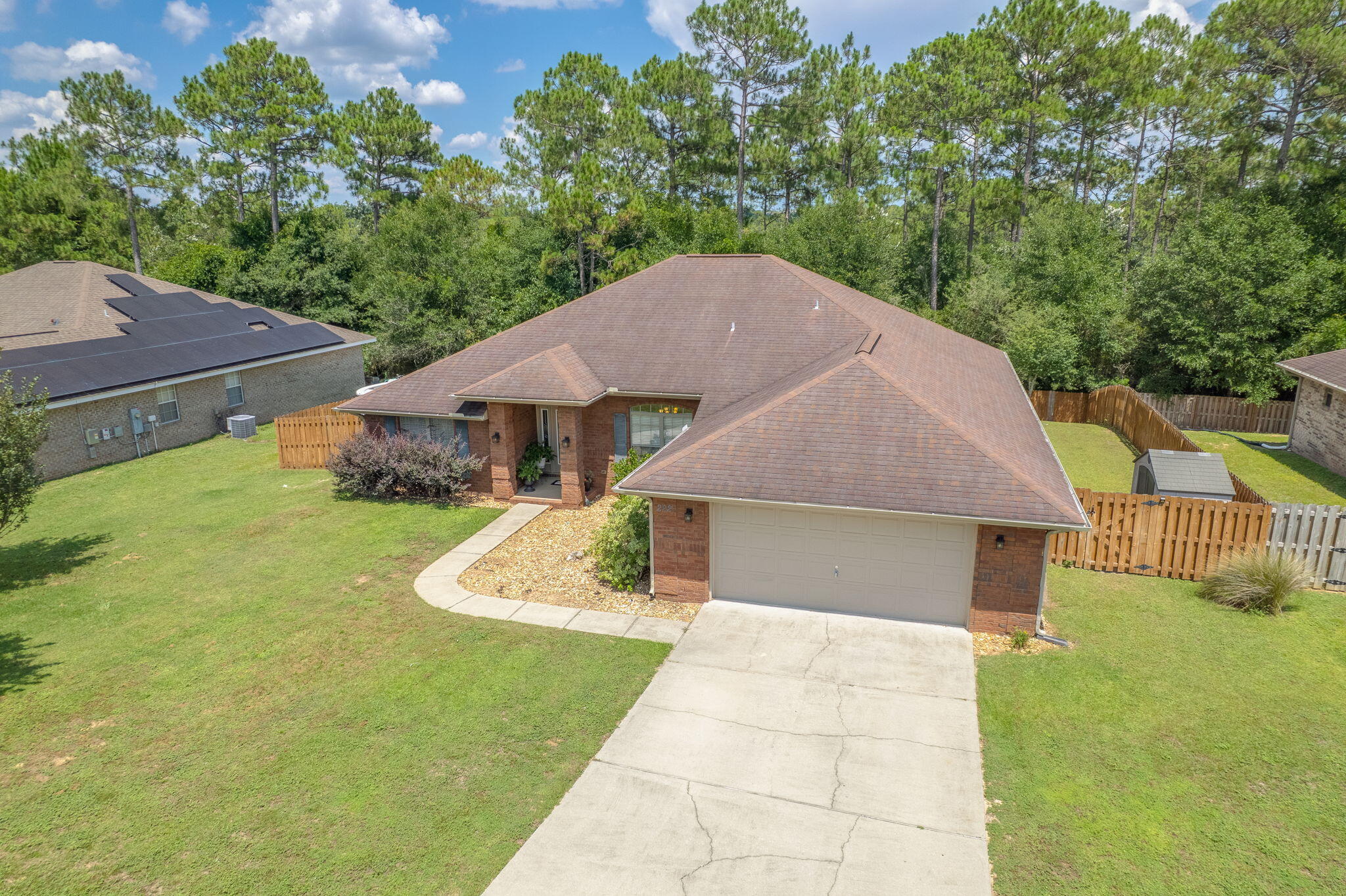 222 Raptor Drive Crestview, FL 32536 - Photo 3 of 70 a aerial view of a house next to a big yard