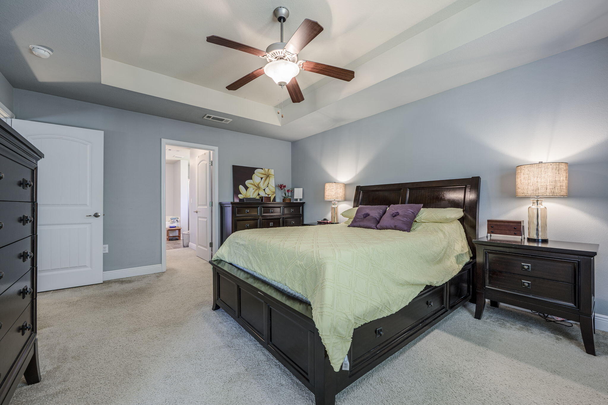 222 Raptor Drive Crestview, FL 32536 - Photo 31 of 70 a bedroom with a bed and a chandelier