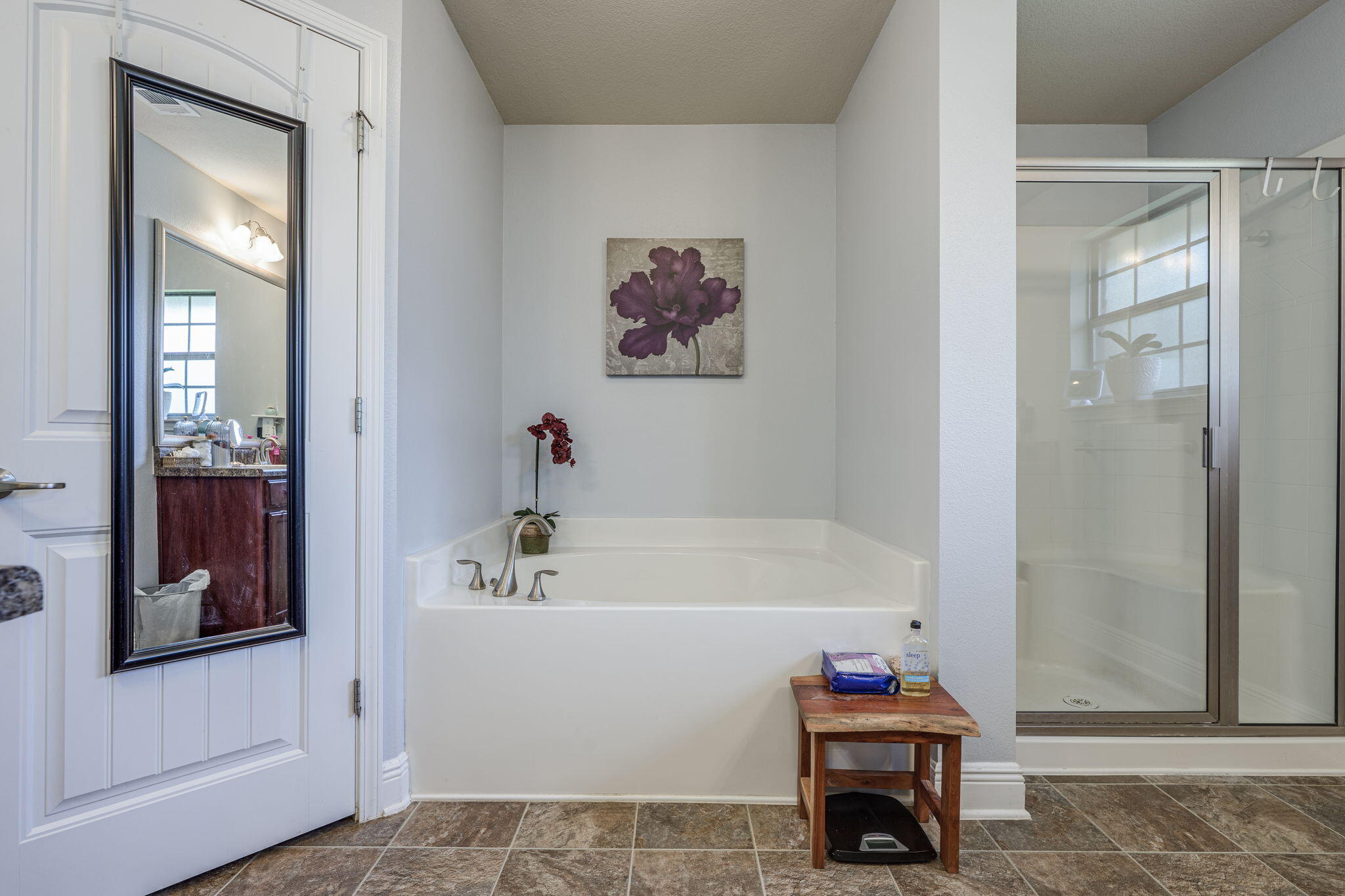 222 Raptor Drive Crestview, FL 32536 - Photo 35 of 70 a bathroom with a tub and a shower