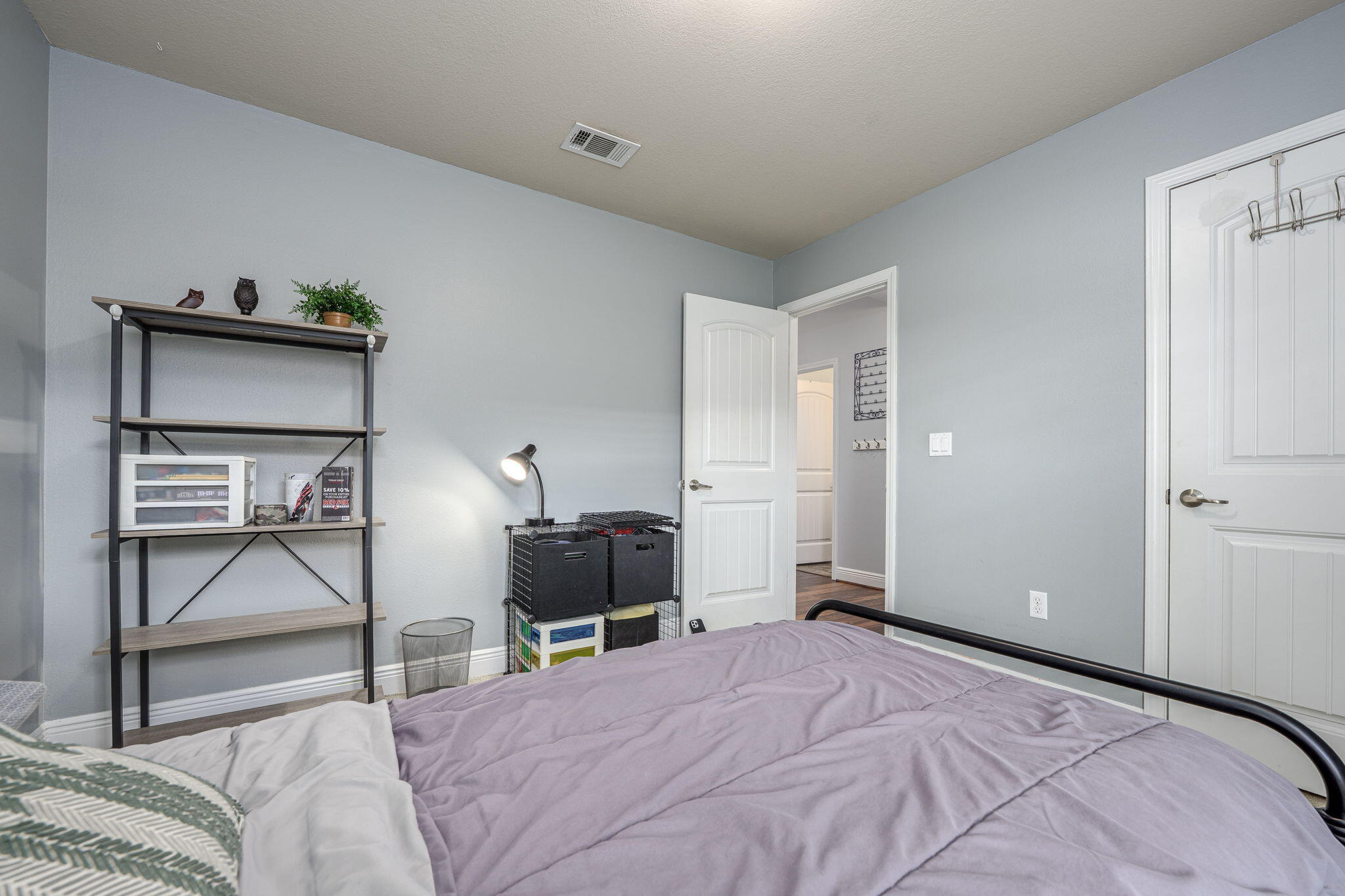 222 Raptor Drive Crestview, FL 32536 - Photo 45 of 70 a bedroom with a bed and a tv on table