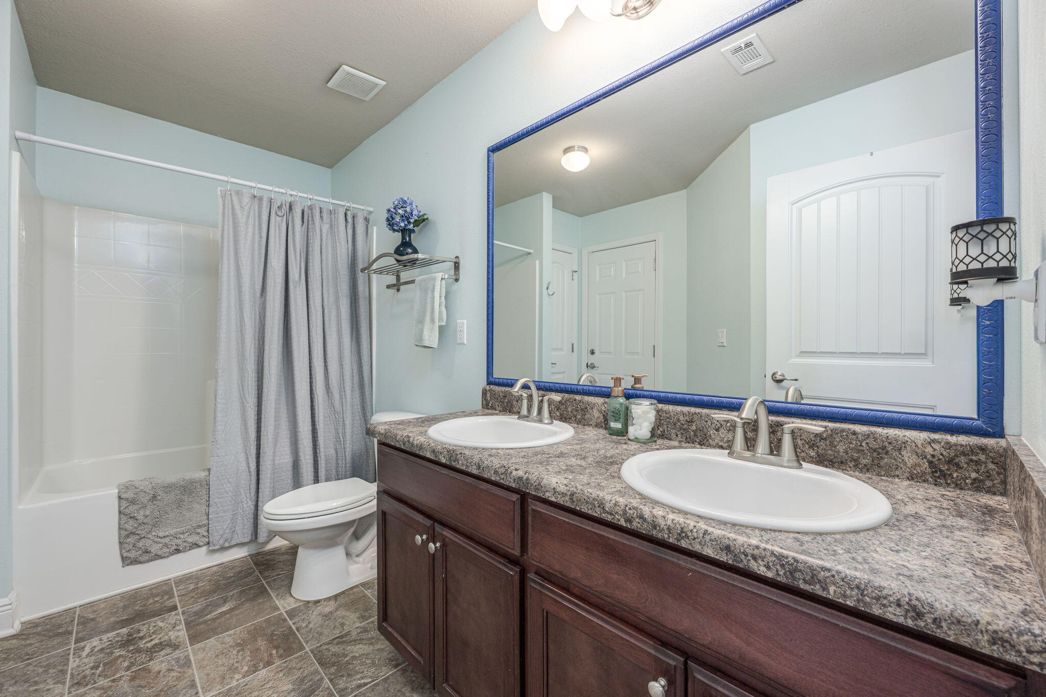 222 Raptor Drive Crestview, FL 32536 - Photo 46 of 70 a bathroom with a granite countertop sink and a mirror