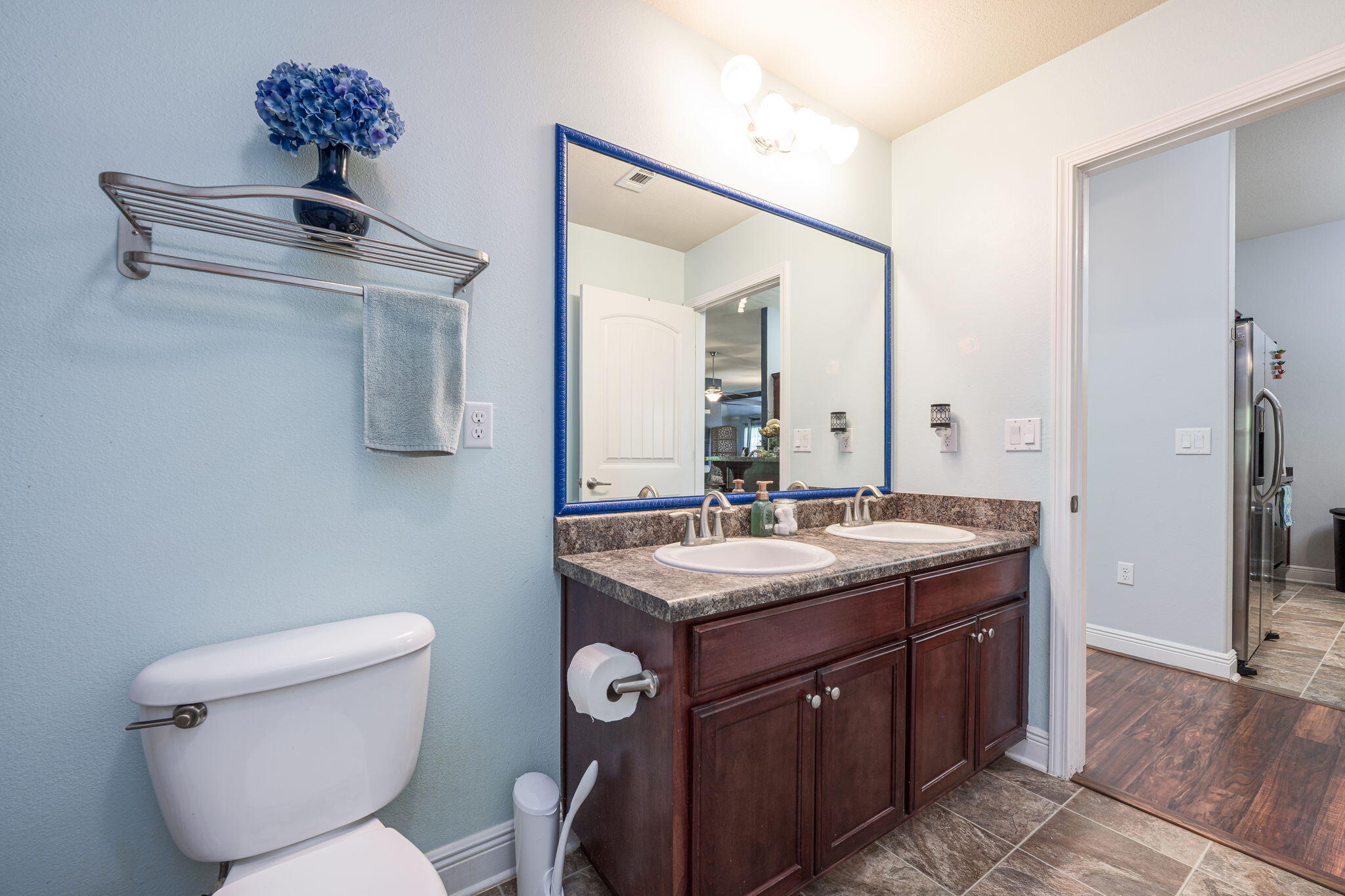 222 Raptor Drive Crestview, FL 32536 - Photo 47 of 70 a bathroom with a granite countertop toilet sink and mirror