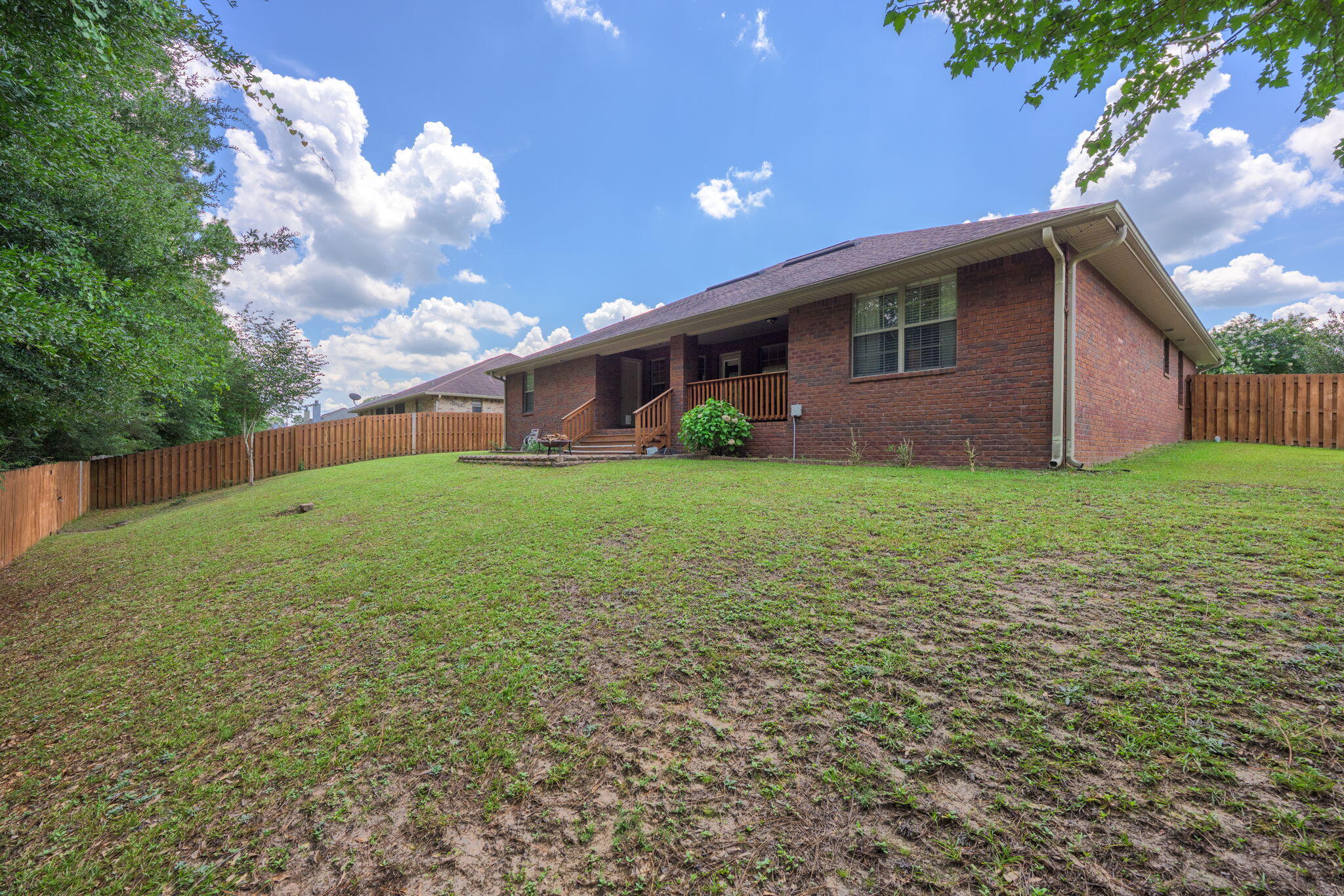 222 Raptor Drive Crestview, FL 32536 - Photo 59 of 70 a backyard of a house with lots of green space