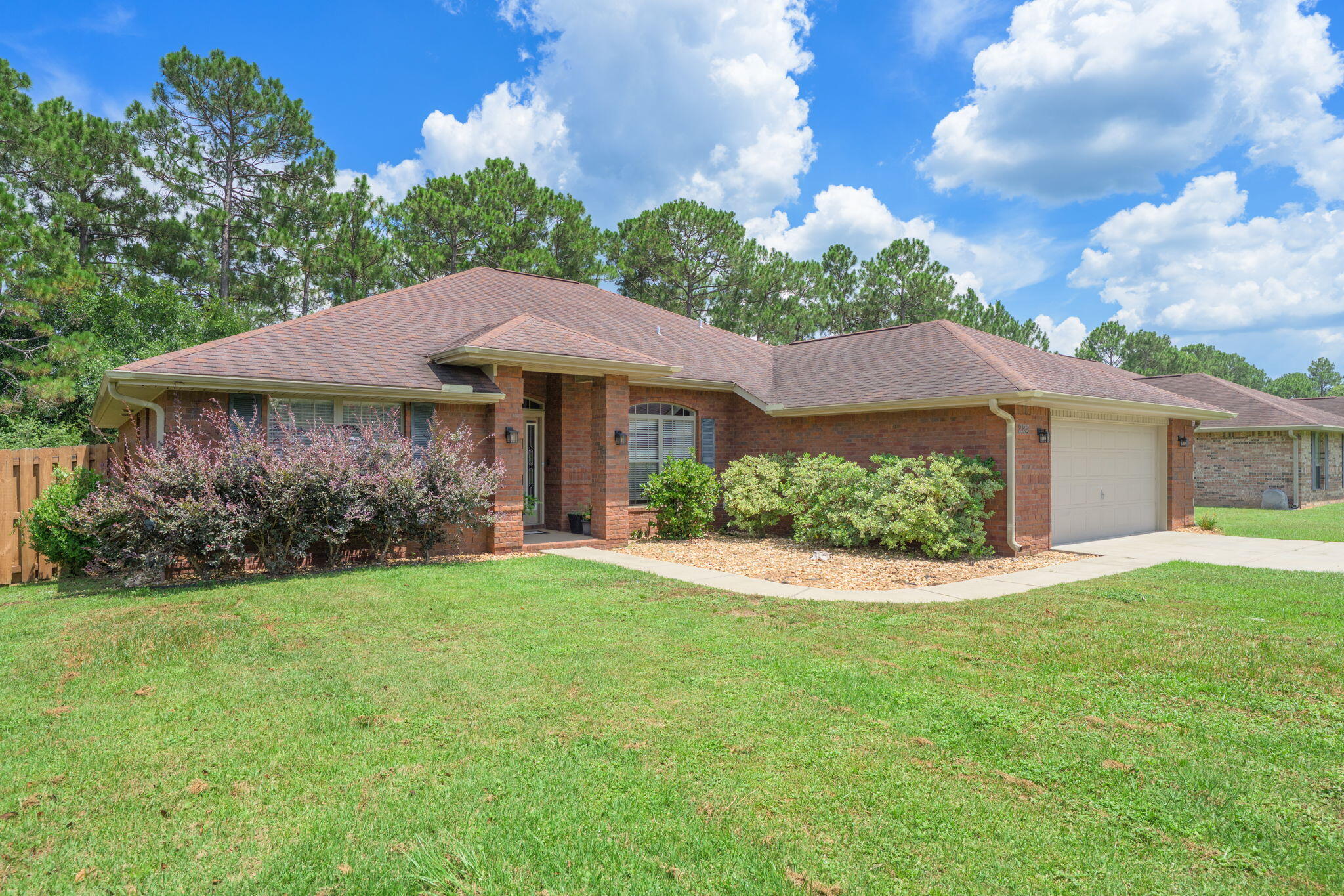 222 Raptor Drive Crestview, FL 32536 - Photo 6 of 70 a view of a house with a garden