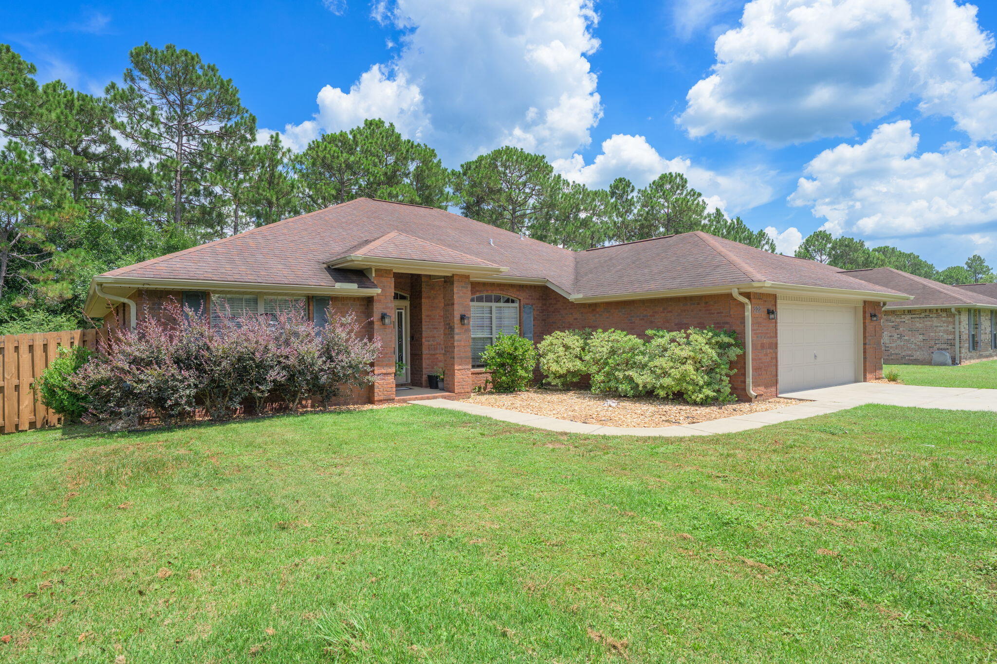 222 Raptor Drive Crestview, FL 32536 - Photo 7 of 70 a view of a house with a garden