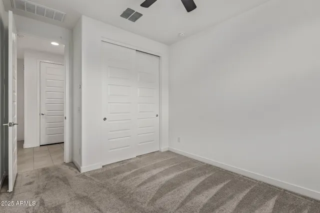 an empty room with closet