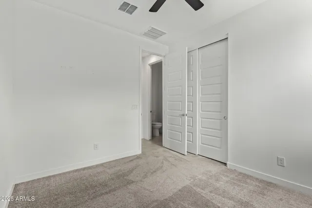 an empty room with closet