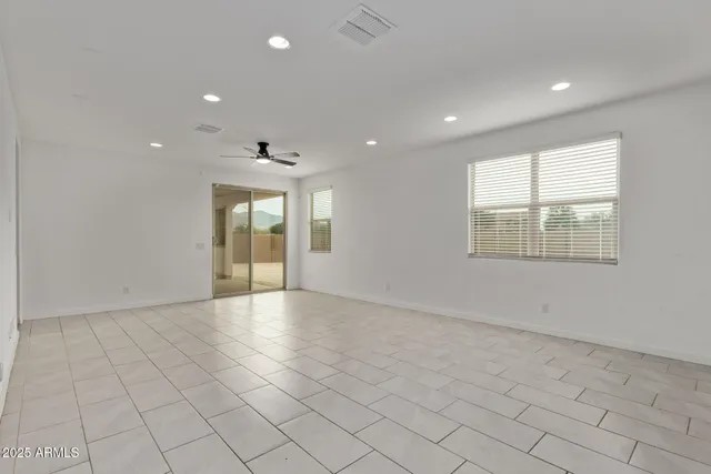 an empty room and window in a room