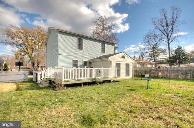 a view of a hallway with windows and natural light