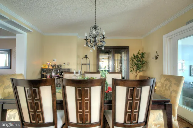 a bathroom with a sink vanity mirror and toilet