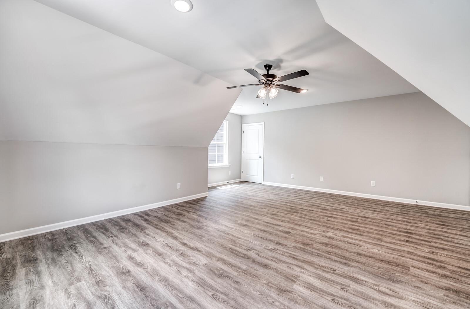 100 Blue Street Oakland, TN 38060 - Photo 36 of 40 wooden floor in an empty room