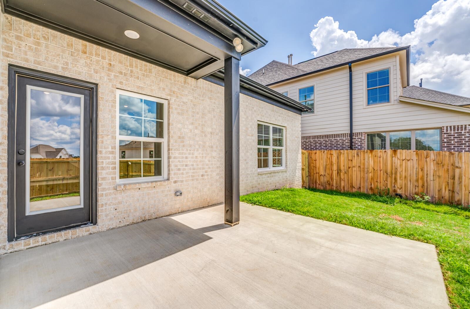 100 Blue Street Oakland, TN 38060 - Photo 38 of 40 a front view of a house with garden